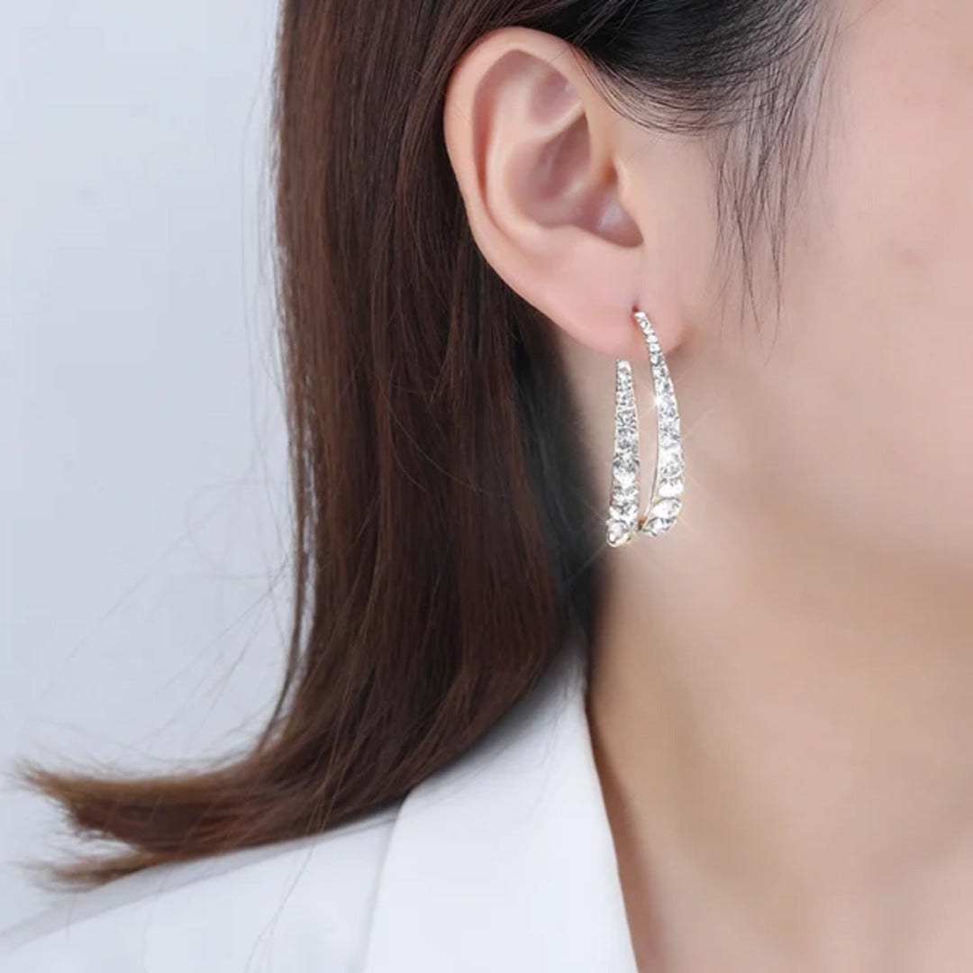 EarGlow™ – Boucles d’oreilles arc audacieuses et remarquables [50% de réduction]