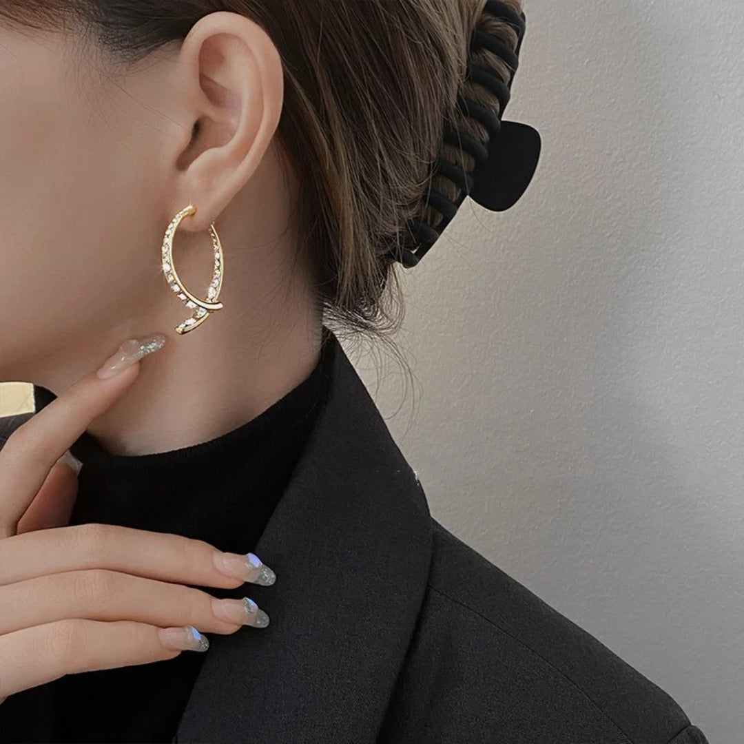 EarGlow™ – Boucles d’oreilles arc audacieuses et remarquables [50% de réduction]