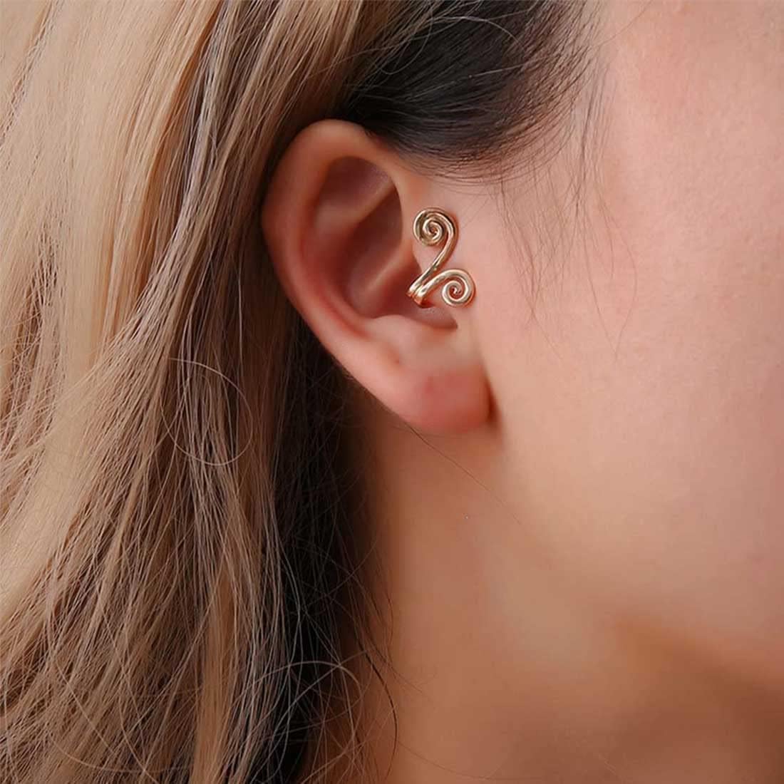 Boucles d'oreilles d'acupression dorées pour le bien-être quotidien