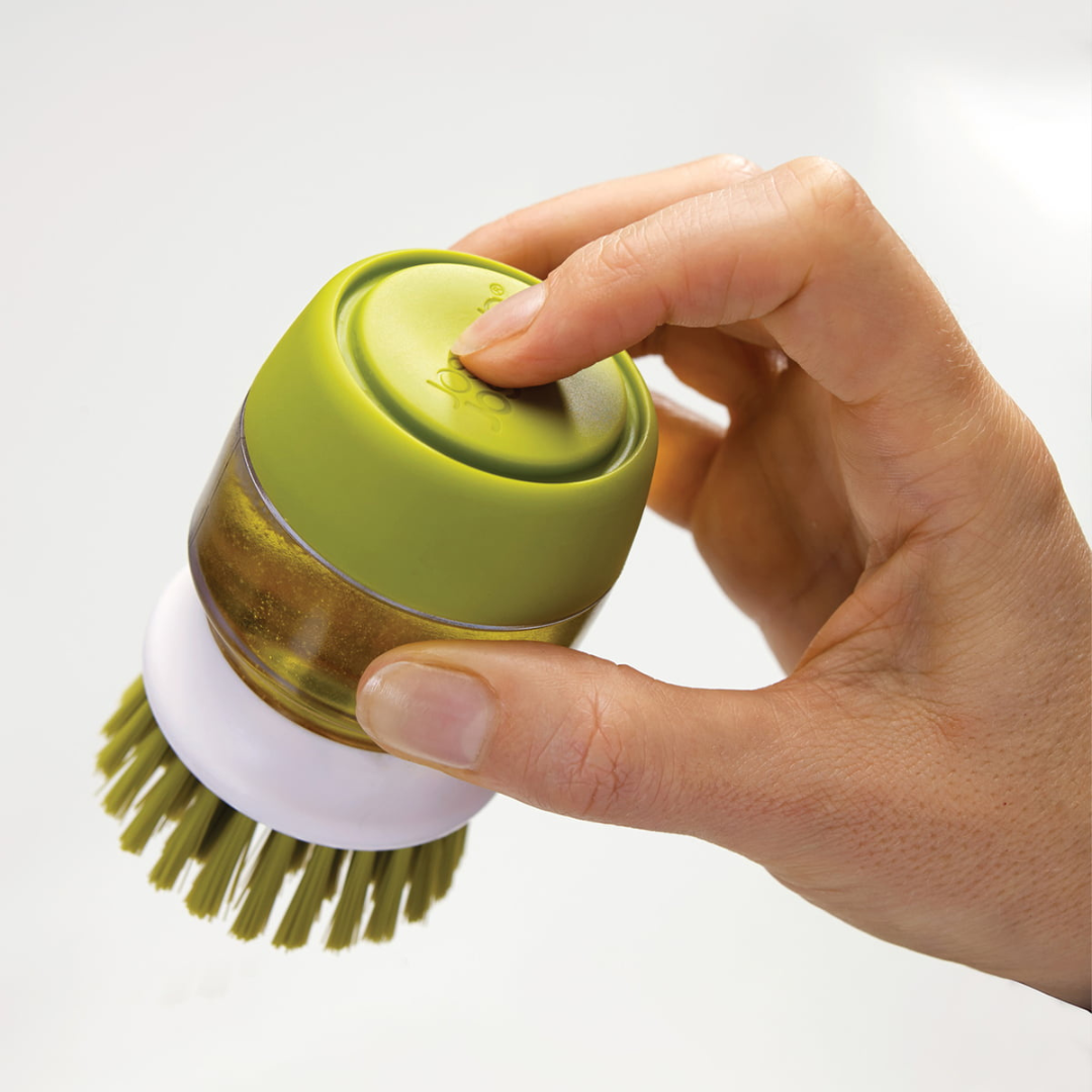 Brosse à vaisselle avec distributeur de savon intégré et support égouttoir