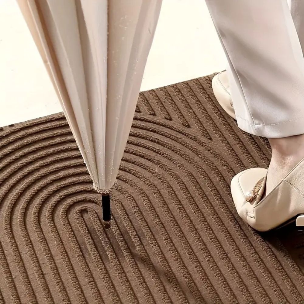 Tapis de sol avec motif en arc et structure nervurée pour intérieur et extérieur