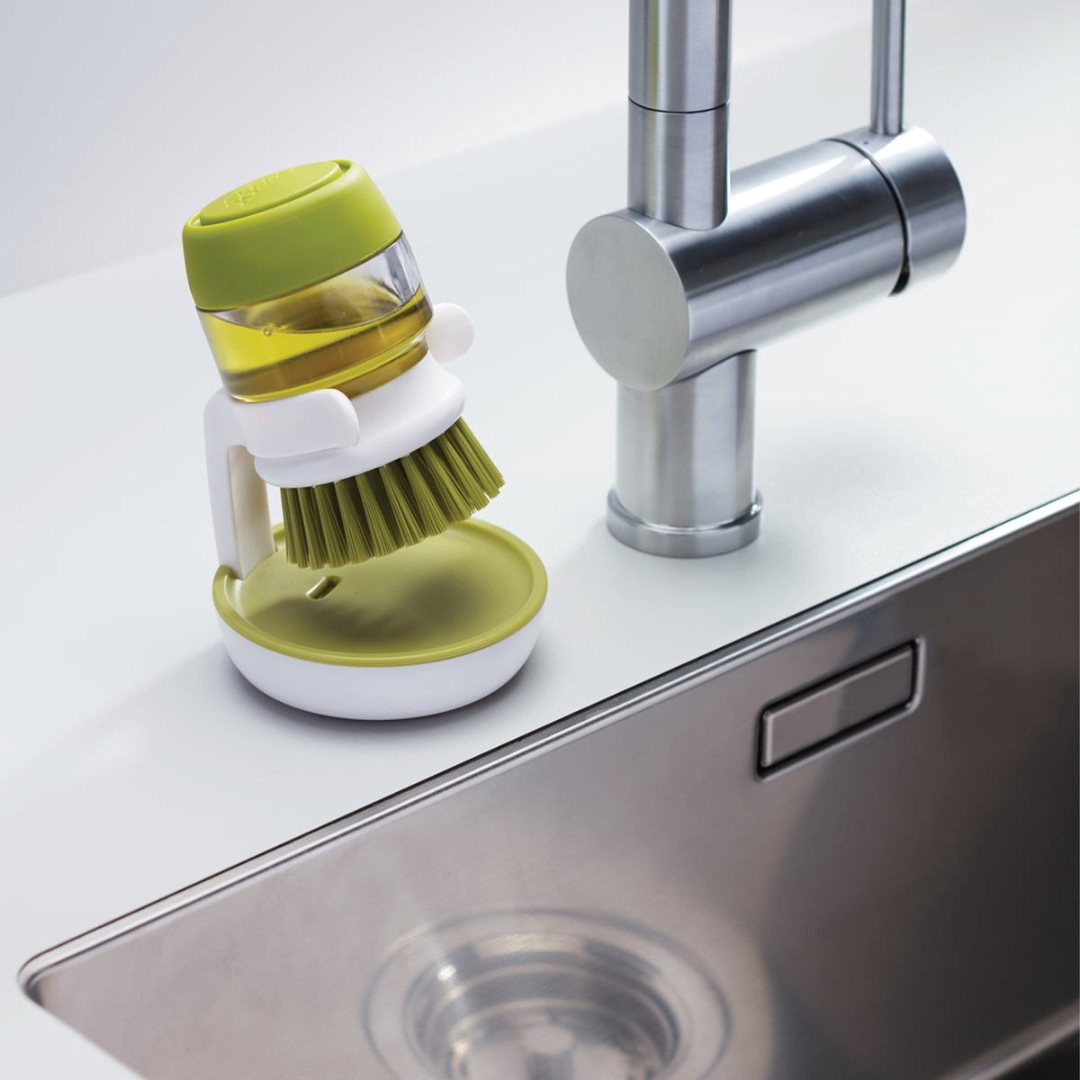 Brosse à vaisselle avec distributeur de savon intégré et support égouttoir
