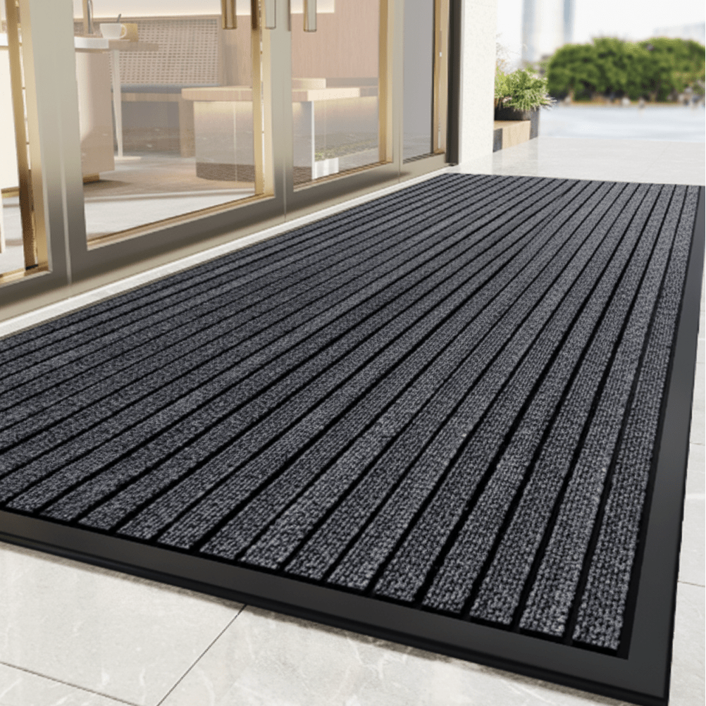Tapis d'entrée robuste avec dessous antidérapant et fonction anti-salissures