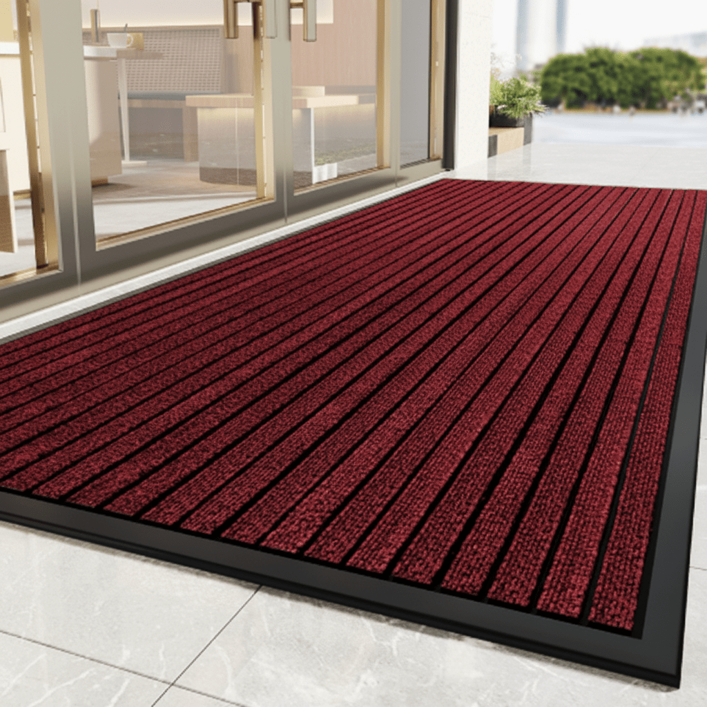Tapis d'entrée robuste avec dessous antidérapant et fonction anti-salissures